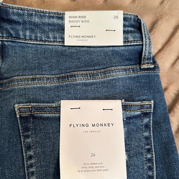 Wide-Leg Distressed Blue Jeans with wide cuff - Picture 4 of 5